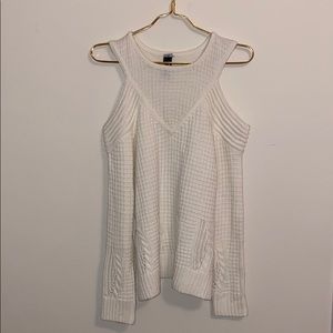 White knit sweater with shoulder cut outs